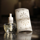 Claire Burke  Wild Cotton Fragrance Oil and Electric Fragrance Warmer Unit